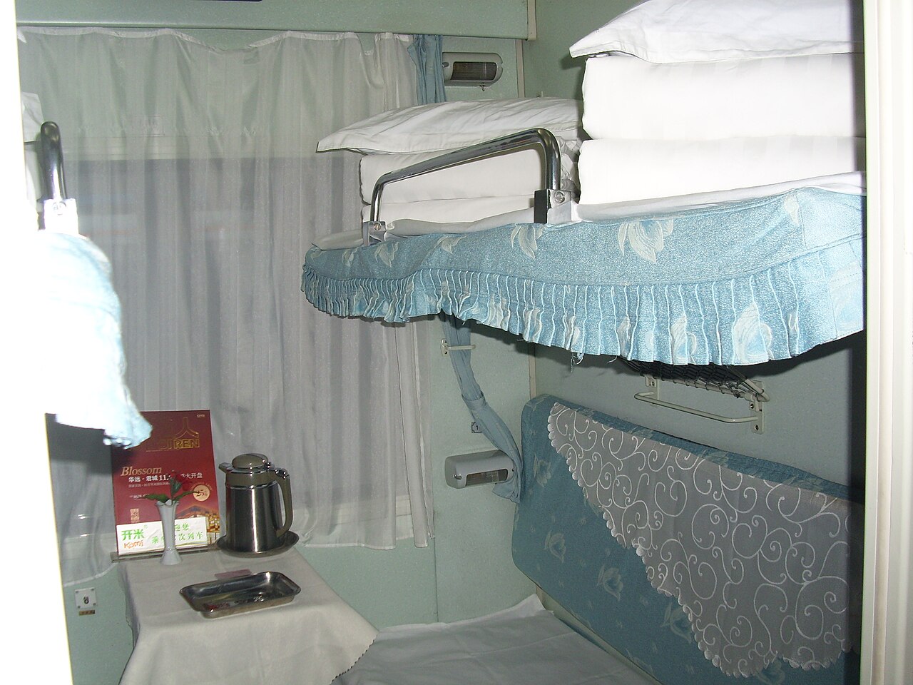 A soft sleeper compartment on train T138 - four berths in a private cabin, a hotel room that moves
